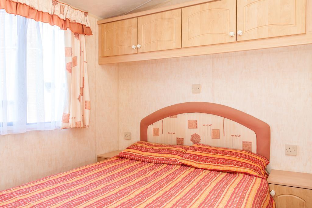 Coral Beach Holiday Park สเกคเนส ห้อง รูปภาพ